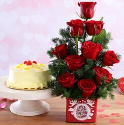 Red Roses with Butterscotch Cake Combo featuring a beautiful bouquet of red roses and a delicious butterscotch cake, ideal for special occasions.