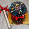 Exotic Choco Pinata Cake with a rich chocolate exterior and surprise center, ideal for a unique and memorable celebration.