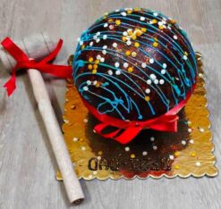 Exotic Choco Pinata Cake with a rich chocolate exterior and surprise center, ideal for a unique and memorable celebration.