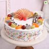 Funfetti Fruit Vanilla Cake featuring a vanilla base with colorful funfetti sprinkles and topped with fresh fruit, ideal for festive occasions.