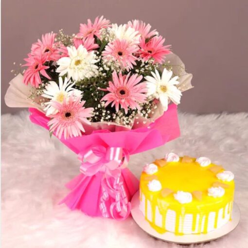 Mix Flowers Bouquet alongside a fresh pineapple cake, showcasing vibrant floral arrangements with a delicious cake, ideal for special celebrations.