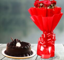 Red Rose Bouquet with a decadent chocolate cake, featuring vibrant roses and a sumptuous cake, perfect for romantic gestures and celebrations.