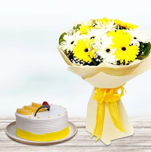 Sunny Gerberas arranged with a pineapple cake, featuring vibrant yellow flowers and a tasty pineapple-flavored cake, ideal for joyful occasions.