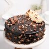 KitKat Chocolate Cake featuring layers of chocolate cake and KitKat bars with rich frosting, ideal for a sweet indulgence.