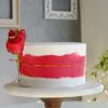 Red Rose Pineapple Cake featuring a pineapple-flavored cake decorated with elegant red roses, ideal for special occasions and celebrations.