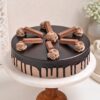 Delicious KitKat Cake featuring layers of chocolate cake and KitKat bars with creamy frosting, ideal for an indulgent treat.