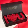 Love Arrangement Roses in Black Box featuring elegant red roses arranged in a sleek black box, ideal for romantic gifts and celebrations.