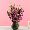 Purple Orchids Bunch featuring a beautiful arrangement of vibrant purple orchids, perfect for enhancing any event with elegance and charm.