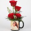 Red Roses Arrangement in Personalized Black Mug featuring elegant red roses arranged in a custom black mug, ideal for a special gift.