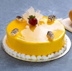 Shinny Mango Cake with a glossy mango glaze and vibrant flavors, ideal for tropical-themed events and special occasions.