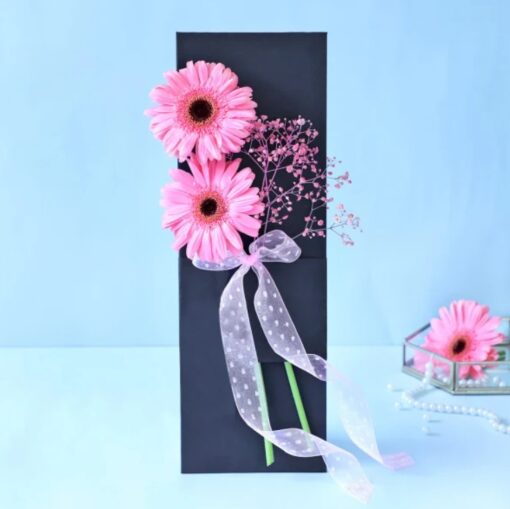 Charming arrangement of slate-colored gerbera daisies, perfect for brightening up any space or as a thoughtful gift.