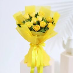 Sunny Delight Bouquet featuring vibrant yellow sunflowers, daffodils, and daisies arranged in a cheerful floral display.