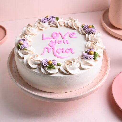 Vanilla Affection Cake decorated with elegant flowers and a heartfelt message, perfect for Mother's Day celebrations.