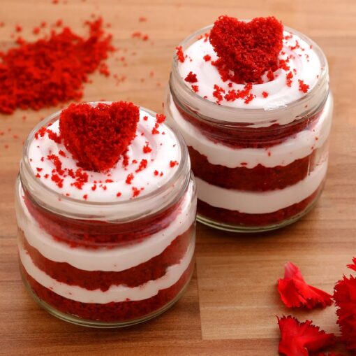 Velvet Bliss Quad Heart Red Velvet Cake Jars featuring four individual jars of rich red velvet cake with heart-shaped decorations, perfect for a romantic or special occasion.