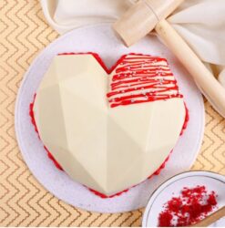 Velvety Heart Pinata Cake with a rich, velvety texture and a fun surprise inside, ideal for adding excitement to any celebration.