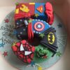 Superhero's Number Cake featuring colorful superhero designs and number decorations, ideal for a fun and themed birthday celebration.