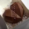 Choco Heart Pinata Cake with a rich chocolate exterior and a hidden treat inside, ideal for adding excitement and indulgence to any celebration.