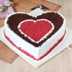 Red Velvet Chocoholic Cake featuring rich red velvet layers and decadent chocolate ganache, offering a luxurious and indulgent dessert experience.