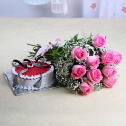 Roses Bouquet with Strawberry Cake, showcasing fresh roses and a delicious strawberry cake, ideal for celebrating special occasions and making moments memorable.