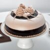 Choco Flower Cake with rich chocolate layers and elegant floral decorations, ideal for a visually stunning and delicious dessert.