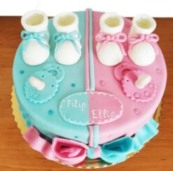 Baby Gender Reveal Celebration Cake featuring vibrant colors and playful designs, perfect for adding joy to your gender reveal party.