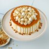 Caramel Drop Cream Cake with layers of creamy frosting and drizzled caramel sauce, ideal for special occasions and dessert lovers.