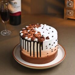 Choco Delight Drip Cake featuring layers of rich chocolate cake with glossy chocolate ganache drips and decorative chocolate accents.