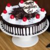 Daughter's Day Black Forest Delight cake featuring rich chocolate layers, cherries, and whipped cream, perfect for celebrating your daughter’s special day.