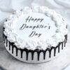 Daughter's Day Delicious Black Forest Cake featuring layers of chocolate sponge, cherries, and cream, perfect for celebrating your daughter's special day.