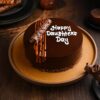 Heavenly Daughter's Day Truffle Cake with rich chocolate layers and decorative truffle toppings, perfect for celebrating your beloved daughter.