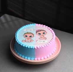 Pastel Pink and Blue Baby Shower Cake featuring elegant decorations, perfect for celebrating the arrival of a new baby at a baby shower.