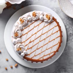 Royal Caramel Delight Cake with rich caramel layers and creamy frosting, elegantly decorated, ideal for celebrations and dessert lovers.