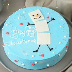 Blue Christmas Dream Cake decorated with wintery blue hues, perfect for adding elegance and holiday cheer to your celebrations.