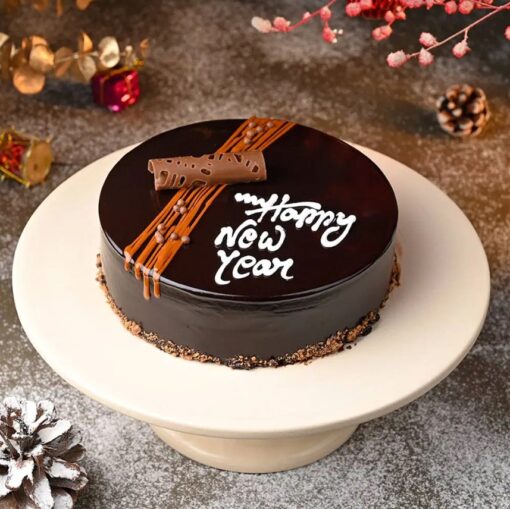 Delicious New Year Chocolate Cake with rich chocolate layers and elegant decorations, ideal for New Year celebrations.