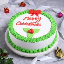 Frosted Christmas Joy Cake with festive frosting and decorations, ideal for holiday gatherings and spreading Christmas cheer.