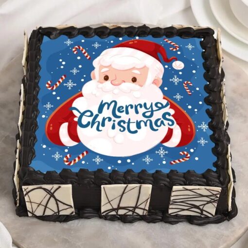 Square of Joy Christmas Cake decorated with festive elements, offering a delightful flavor to your holiday celebrations.