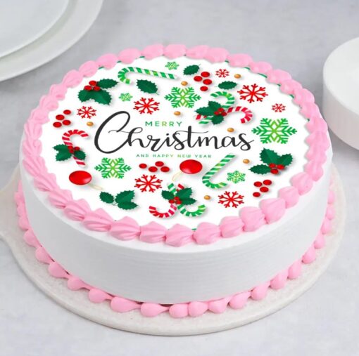 Christmas Photo Magic Cake with an edible photo centerpiece, festive frosting, and holiday decorations.