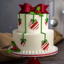 Tiered Christmas Magic Cake, featuring elegant layers and festive decorations, bringing a magical touch to your holiday celebrations.