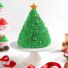 Chocolate Christmas Tree Cake decorated with festive accents, shaped like a tree, bringing a rich, sweet treat to your holiday table.