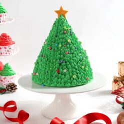 Chocolate Christmas Tree Cake decorated with festive accents, shaped like a tree, bringing a rich, sweet treat to your holiday table.