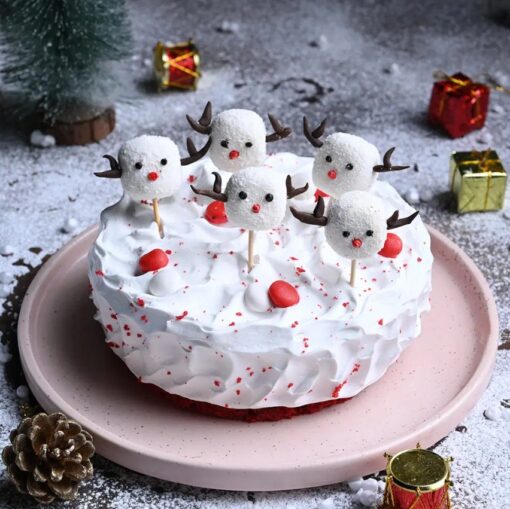 Frosted Velvet Christmas Cake with red velvet layers, cream cheese frosting, and a festive holiday decoration, perfect for Christmas celebrations.