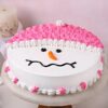 Delicious and festive Creamy Snowman Cake featuring a charming snowman design, perfect for holiday celebrations.