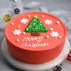 Christmas Tropical Cake with tropical fruits and holiday decorations, offering a unique and flavorful treat for Christmas festivities.