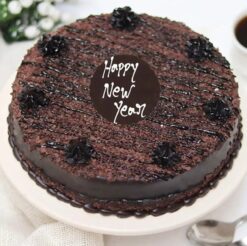 Decadent Chocolate Truffle New Year Cake with rich layers and festive decorations, perfect for celebrating the New Year in luxurious style.