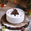 Pineapple Evergreen Christmas Cake featuring tropical pineapple flavors and an elegant evergreen design, ideal for Christmas celebrations.