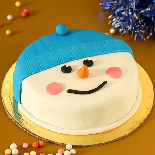 Snowman Delight Truffle Cake with rich truffle layers and a festive snowman decoration, ideal for holiday parties and gatherings.