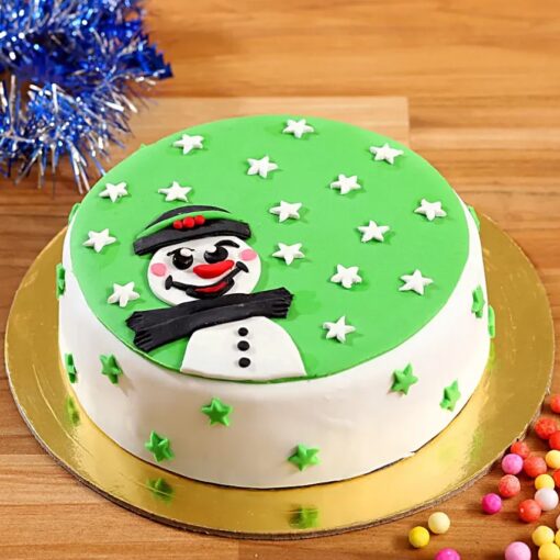 Snowman’s Chocolate Delight Cake with rich chocolate layers and a cute snowman decoration, ideal for Christmas and holiday celebrations.