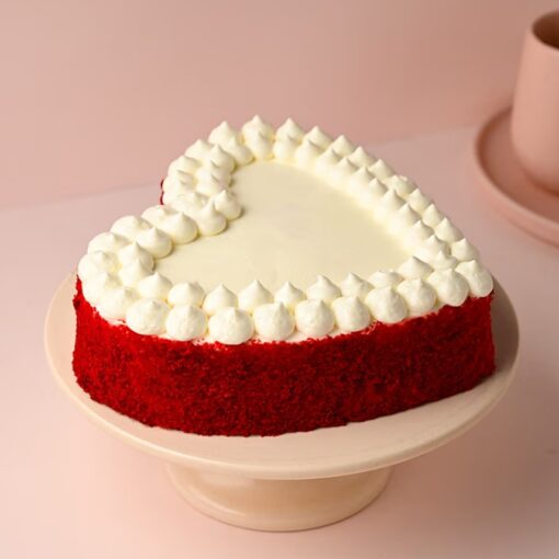 Scarlet Heart Velvet Bliss cake, a luxurious red velvet dessert with a soft, velvety texture and a stunning red heart design.