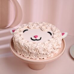 Velvety Cocoa Lamb Cake with rich cocoa layers, shaped like a lamb, ideal for Easter or springtime celebrations.