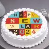 Vibrant Joy New Year Cake featuring colorful layers and festive decorations, perfect for adding cheer and delight to your New Year celebration.